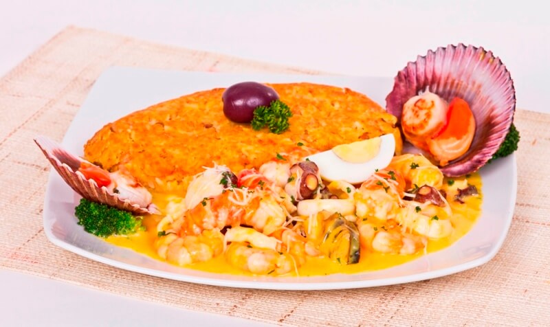 Tacu Tacu con picante de mariscos